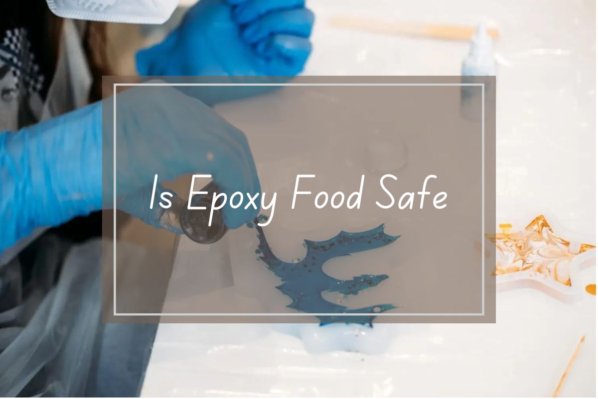 Hands in blue gloves applying epoxy resin, question: is epoxy food safe.