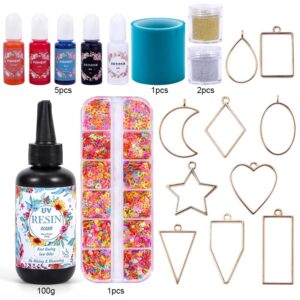 Craft kit with resin, pigments, glitter, and metal charms.